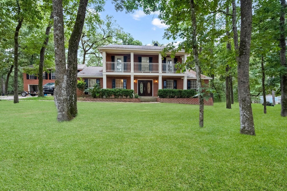 8 W Lake Forest Ct, Conroe, TX 77384 - photo 1