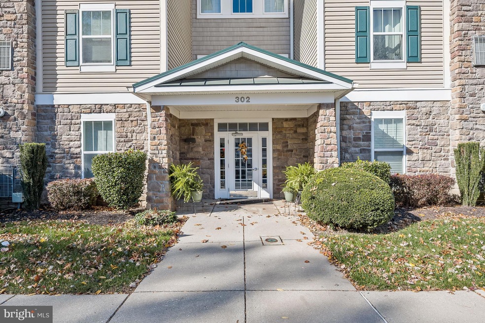 302 Wyndham Cir unit 302B, Owings Mills, MD 21117 - photo 1
