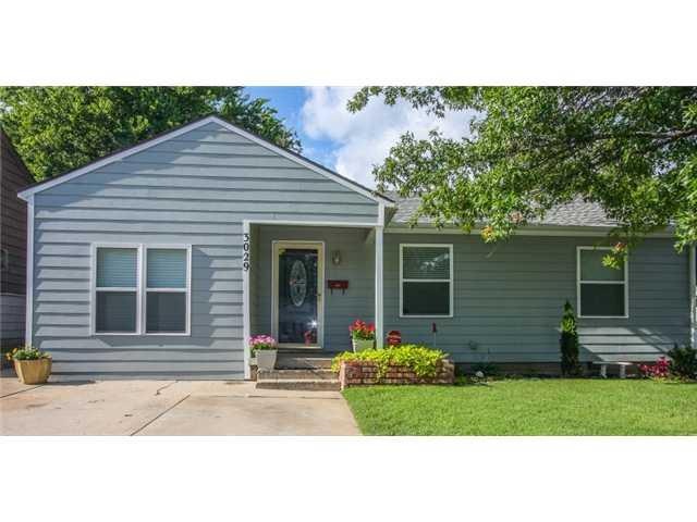 Exterior Front. Such curb appeal on this cute bungalow!.  Owner put James Hardi Concrete Siding on the outside.  So durable you won t have to replace from normal wear and tear.  Well maintained yard and gorgeous flowerbeds.