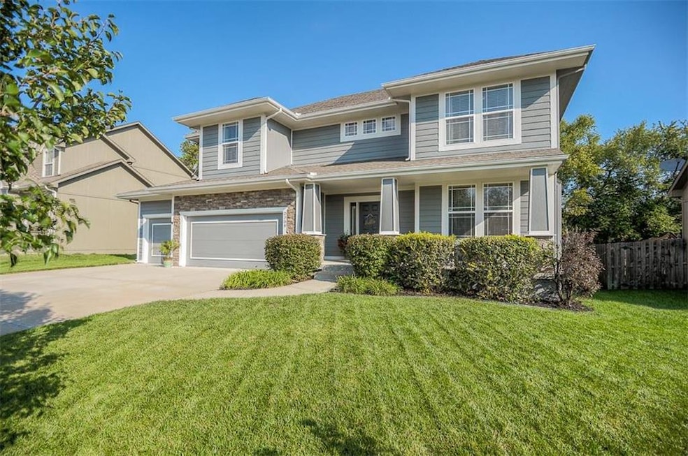 Front of Home with Nice Yard & Landscaping.