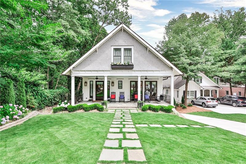 This picture perfect cottage style home features 3