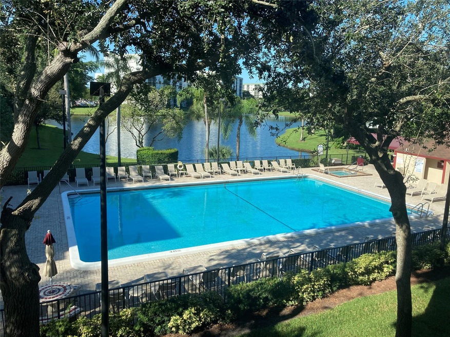 Great view of the pool and lake from the LR