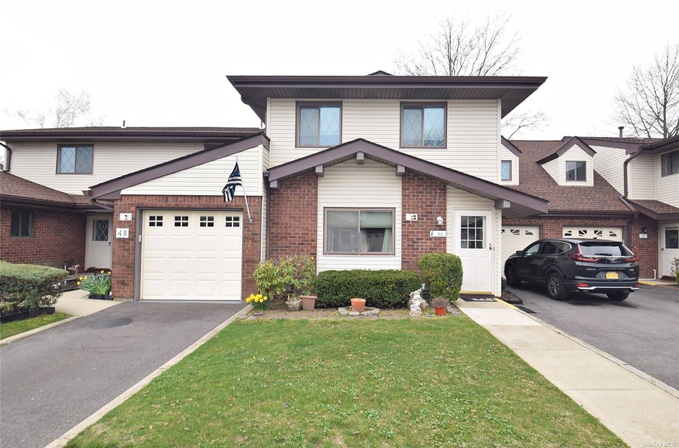 50 Cambridge Dr W unit 50, Copiague, NY 11726 - photo 1