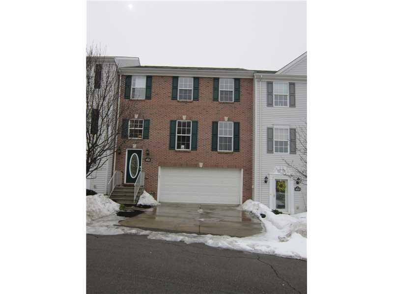 Exterior Front. Brick Front Unit.  Two Car Integra