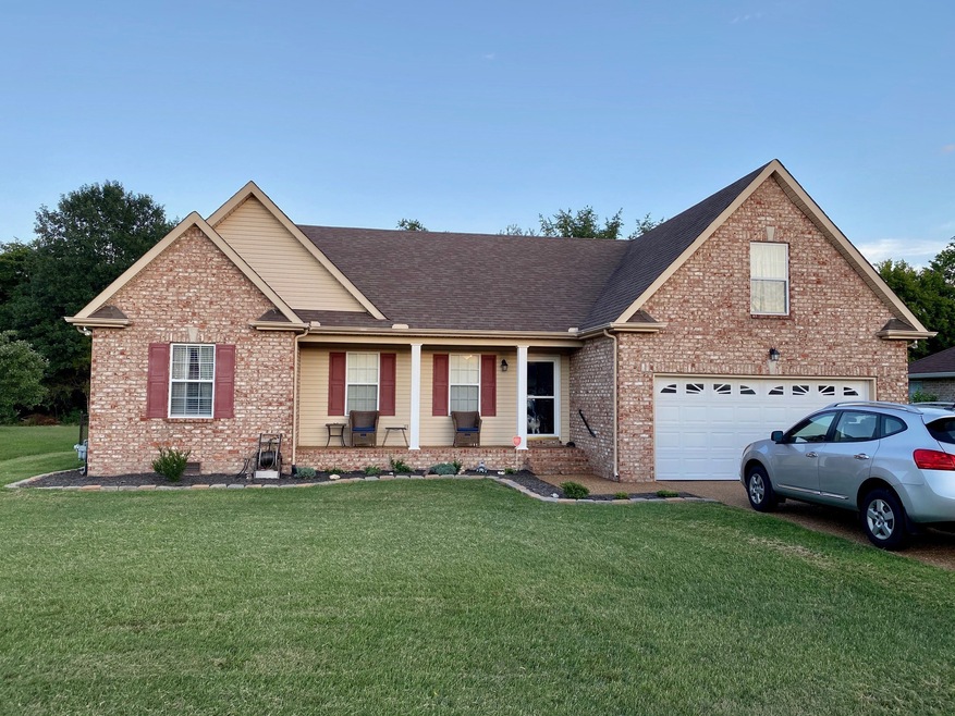 Welcome home! Beautiful landscaping with rocking chair front porch! 