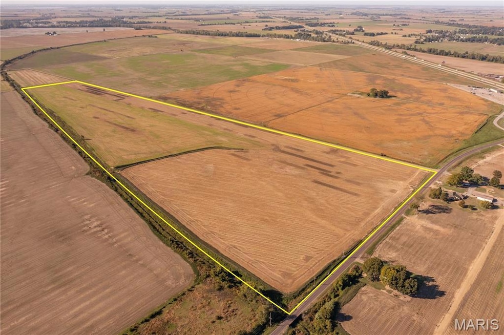 Overview of rural landscape with property parcel outlined