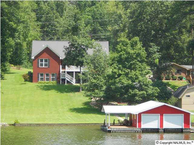 4BR/3.5 BA Waterfront Home featuring 3300+/- total sq. ft. plus approximately 600sf unfinished 3rd level floor space.