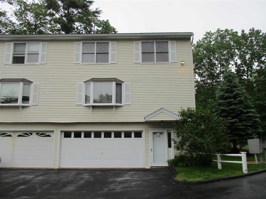 628 Hackett Hill Rd unit A001, Manchester, NH 03102 - photo 1