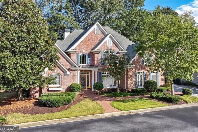 View of front of house featuring a front lawn
