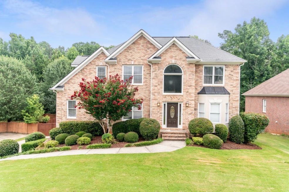 Gorgeous 3-sided brick home
