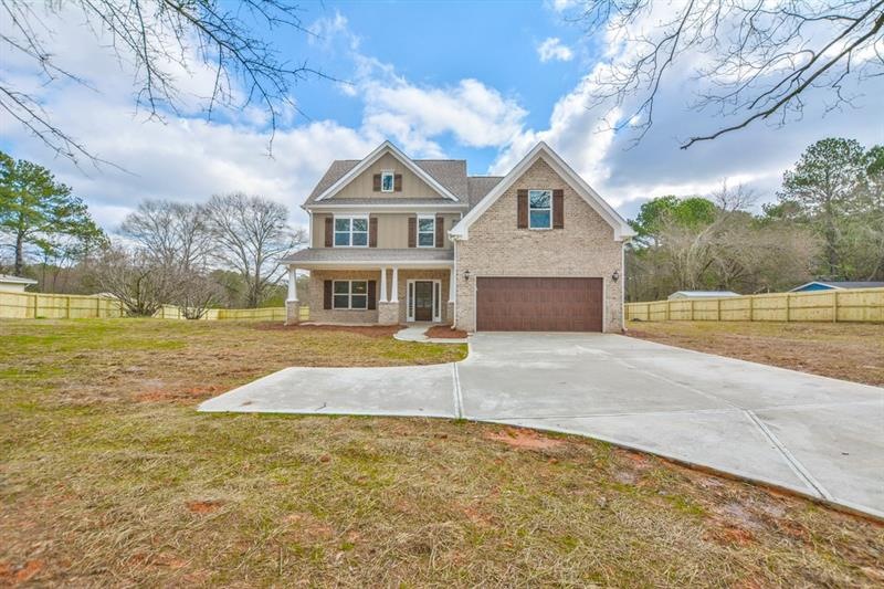 1738 Hewatt Rd SW, Lilburn, GA 30047 - photo 1