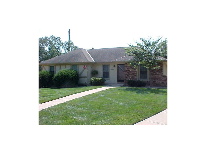 A raised ranch with garage and basement in the rea