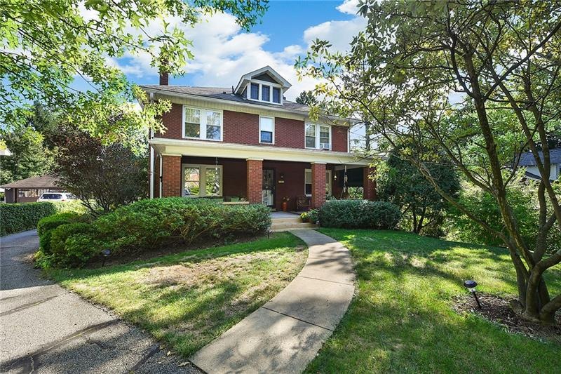 This large solid brink home is nestled in the hear