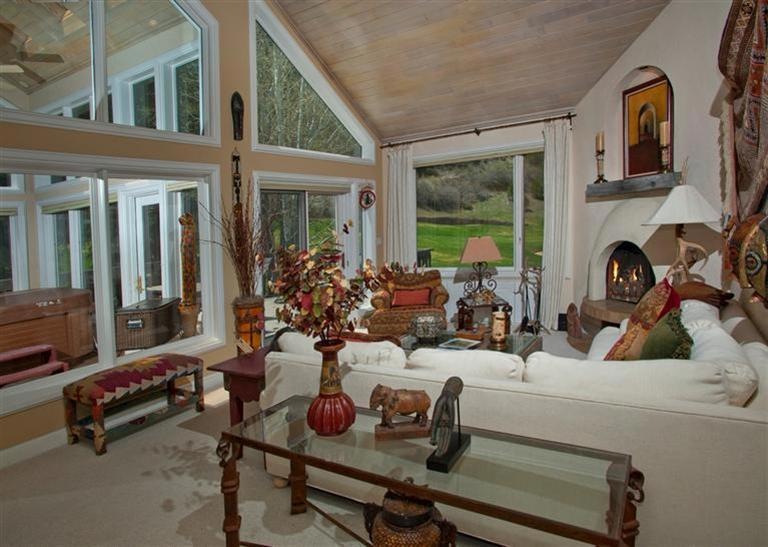 Spacious and light-filled living room wi