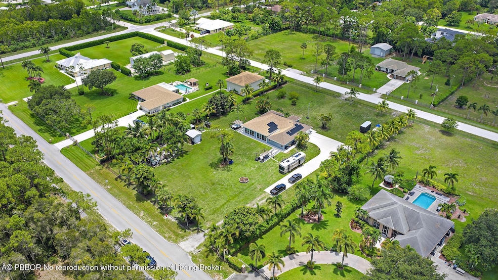 Over 2 acres on paved road!