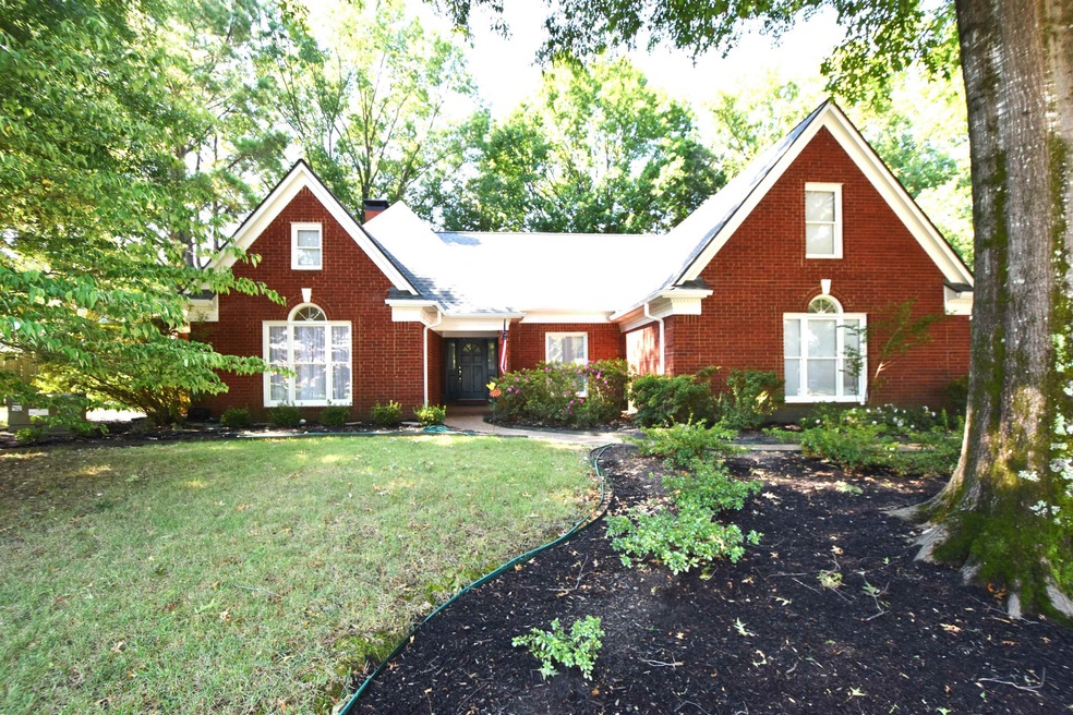 View of front of house with a front yard