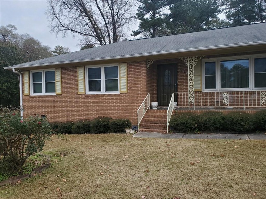 View of front of property with a front lawn