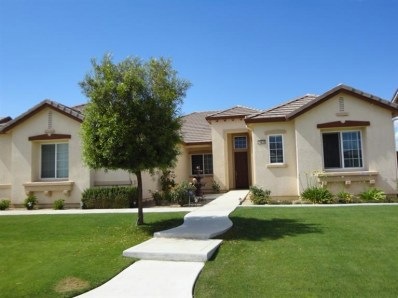 The Tuscan design is welcome and inviting with a water fountain and warm entry.