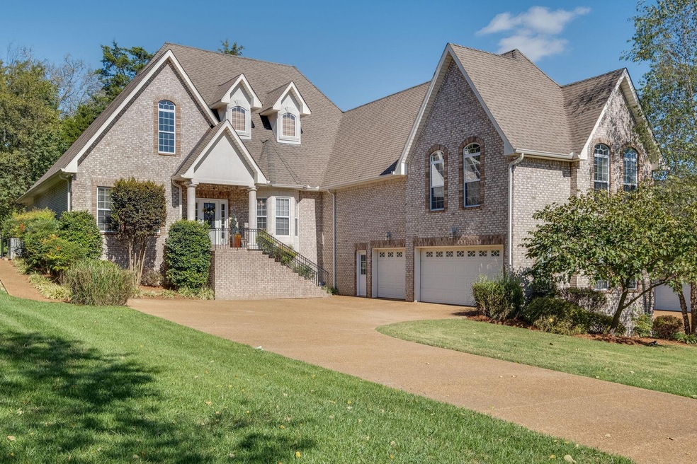 Where Executive Luxury meets Comfort & Convenience Distinguished All Brick Custom Home, Covered Front Porch, Aggregate Driveway, Three Car, Dimensional Shingles, Eave Lights, 4 Bedrooms, Flex Room, 4 Full Baths, One 1 Half Bath, Approx. 3,835 Sq ft 