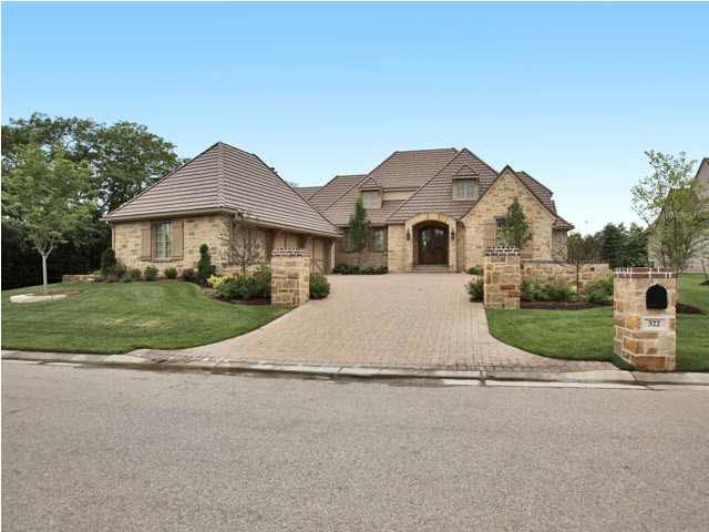 Mostly stone with real stucco European exterior wi