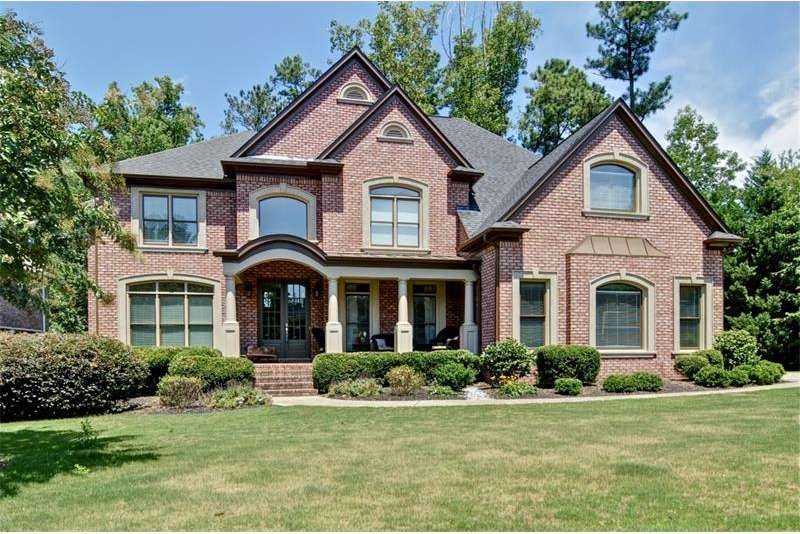 Spectacular home in Woodmont Golf & Country Club. 