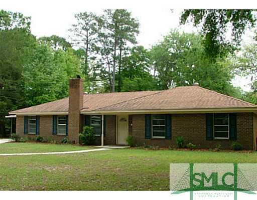 Exterior Front. All brick home in Windsor Forest. 