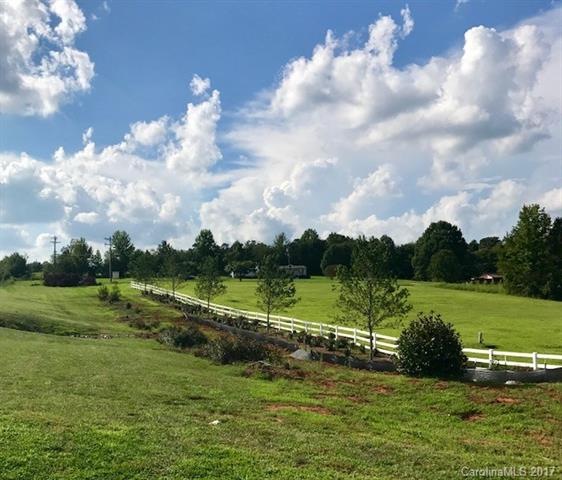 Lot#2 is just short distance past the fence at ent