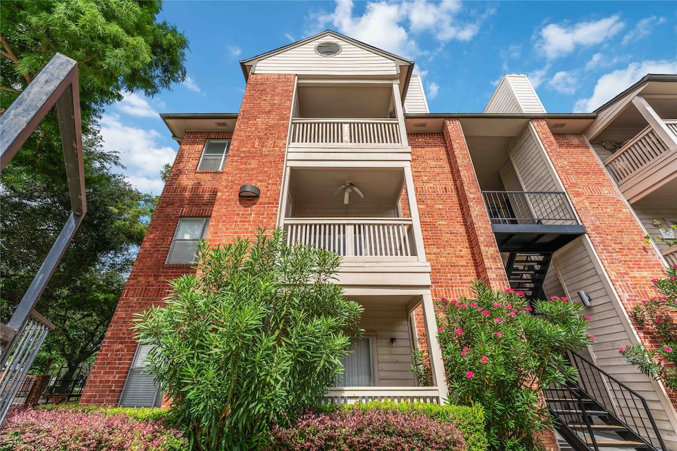 Welcome to 4041 Drake Unit 103. Top floor condo wi