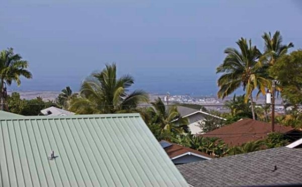 This cozy house in Harbor View earns its name with a direct view of Honokohau Harbor!
