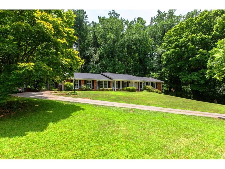 Beautiful all brick home sits graciously on 1.1+  