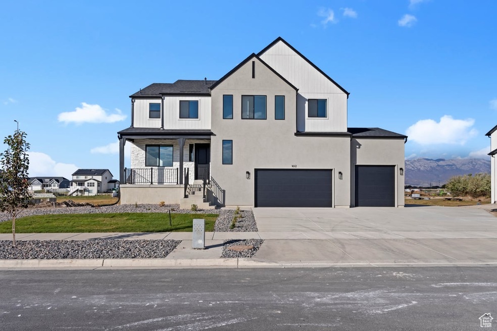 Great 6 Bedroom home with a finished ADU in basement.   Home has front yard landscaping and RV Pad