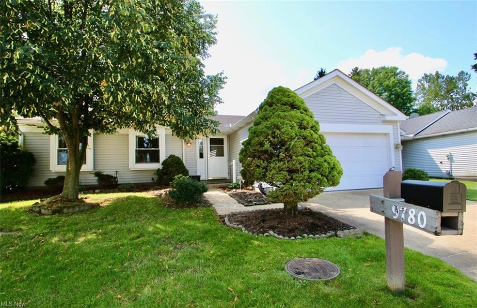 View of front of house featuring garage and a fron