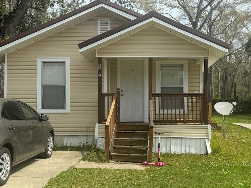 View of front of property featuring covered porch 