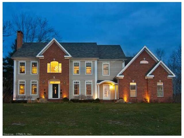 Exterior Front. Exterior lighting and landscaping 