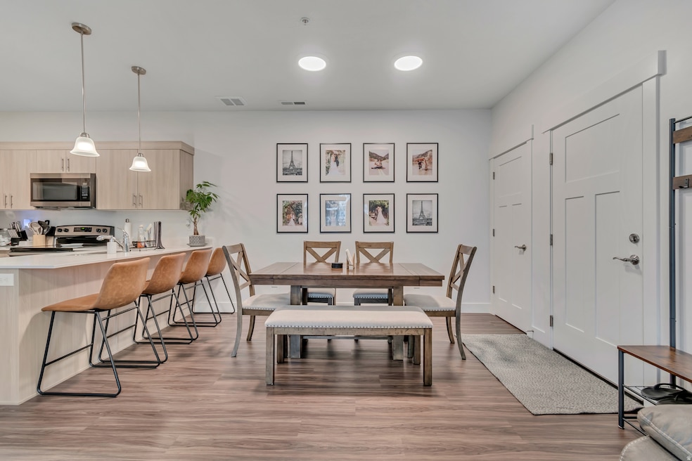 Dining area featuring light wood-style floors