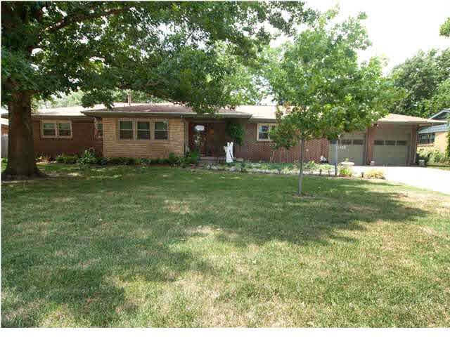 Nice Brick Home 2 car Garage and great trees