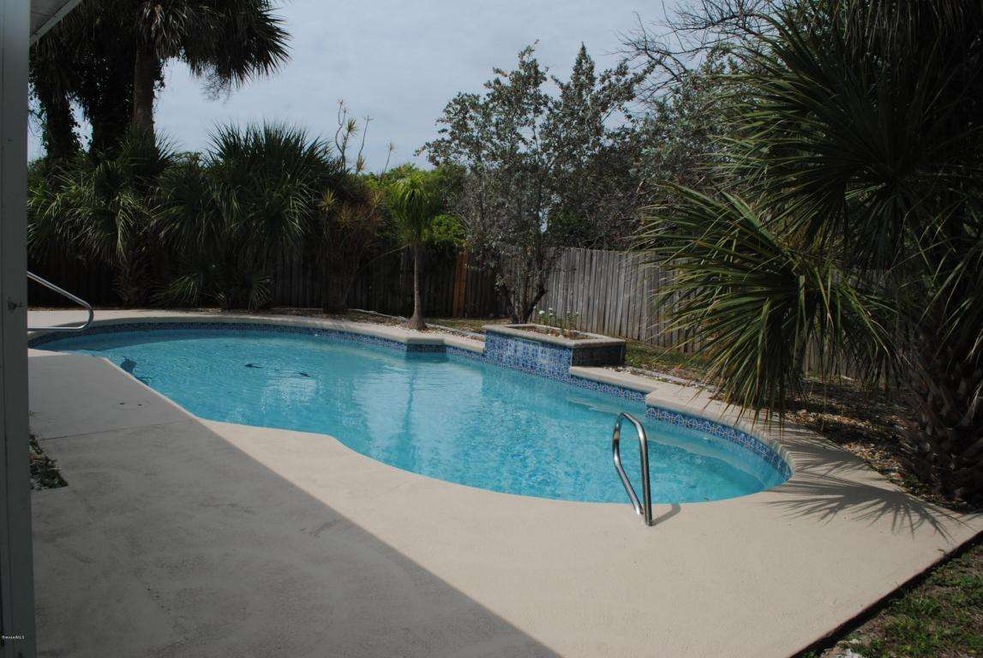 Fenced in pool is ready to splash in