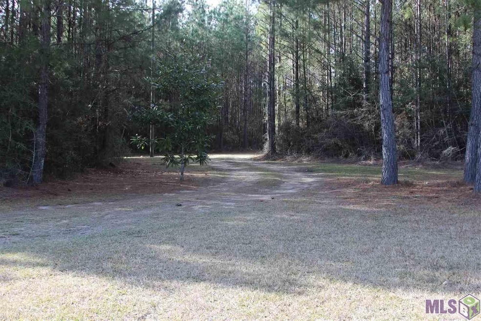Gated driveway into the property. Secluded from th