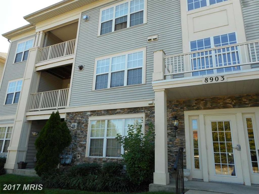 8903 Stone Creek Place unit 201, Pikesville, MD 21208 - photo 1