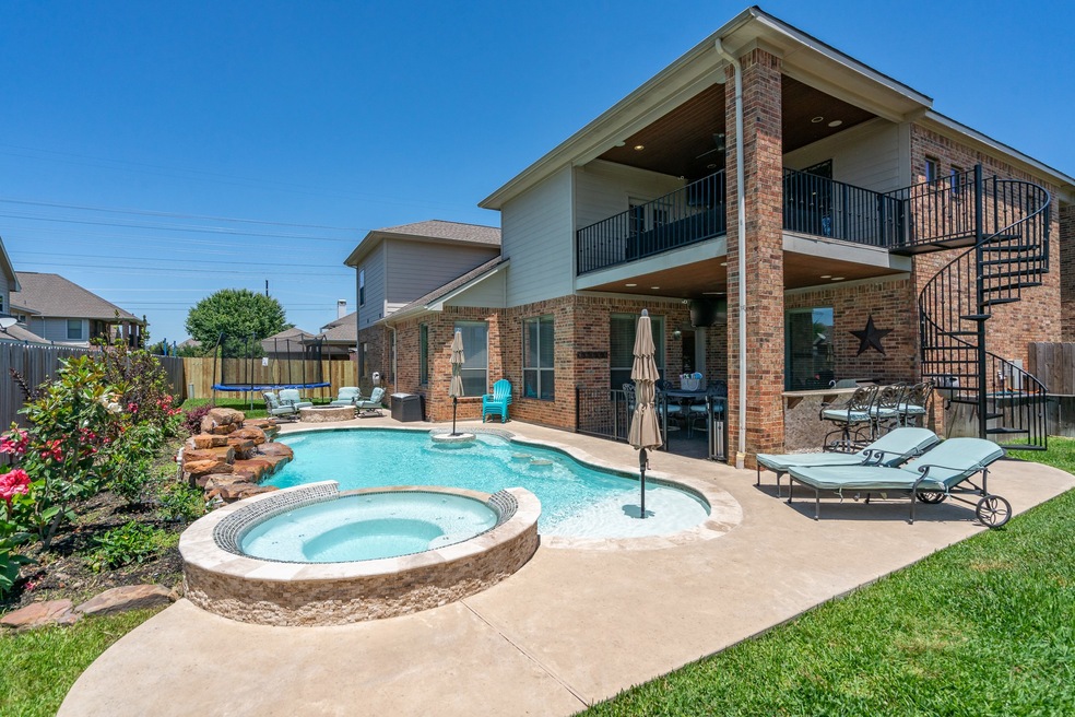 Check out this awesome backyard! This pool has an