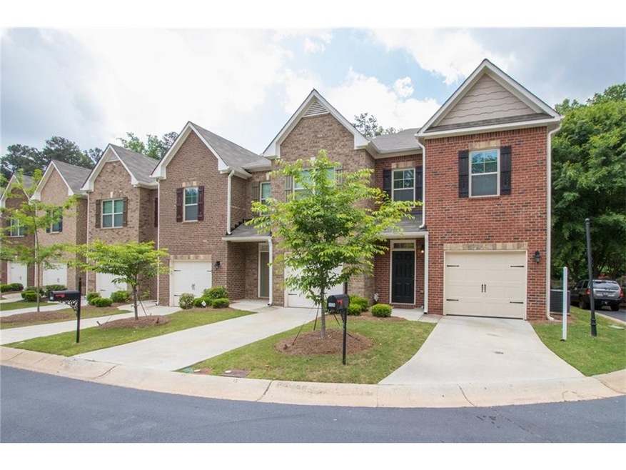 TOWNHOME WITH FOUR BEDROOMS IN GATED COMMUNITY