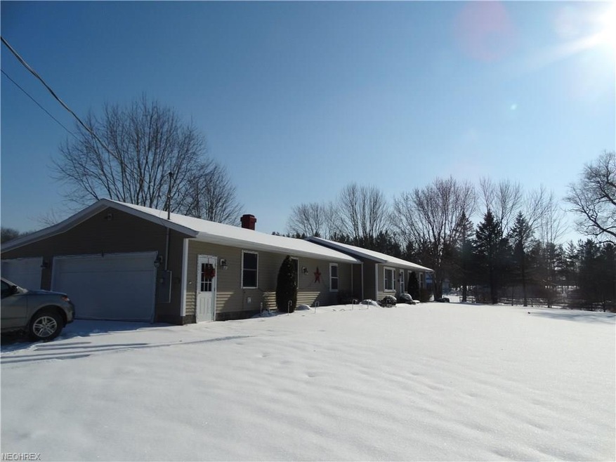 3 bedroom, 3 car attached garage on 5 acres