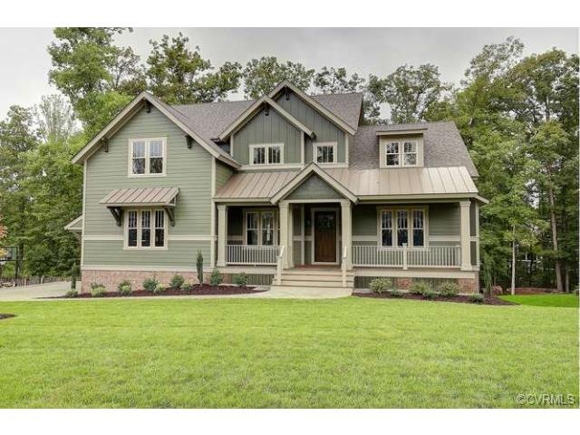 Fiber cement siding, metal roof at porch and dorme