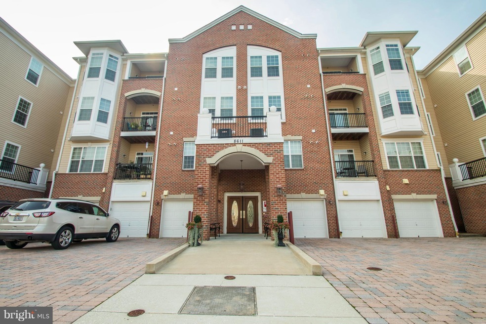 8611 Wintergreen Ct unit 304, Odenton, MD 21113 - photo 1