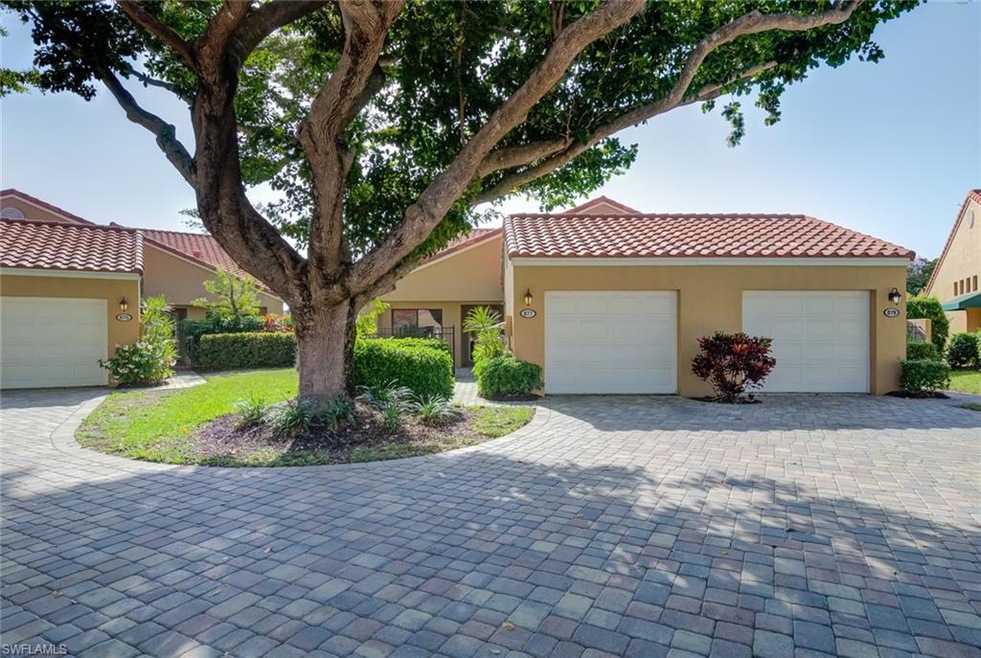 FRONT OF VILLA; SINGLE CAR DETACHED GARAGE; PAVERS