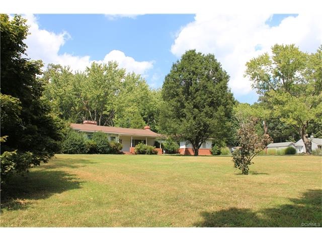 Large lot with house set far back from the street.