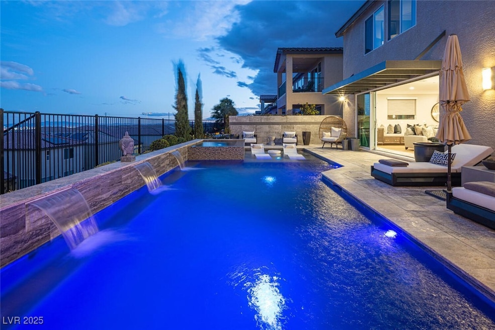 View of swimming pool featuring a fenced backyard,