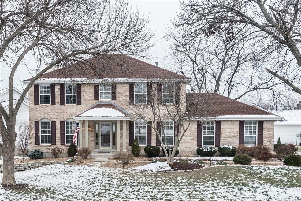Stately two story in desirable Twin Chimneys subdi