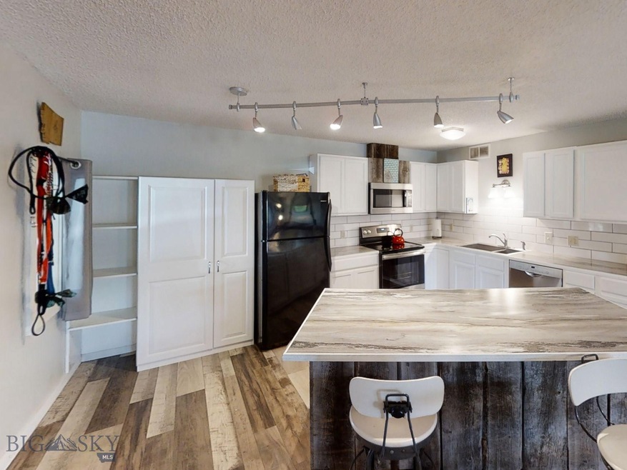 149 Juniper Berry Dr unit B, Big Sky, MT 59716 - photo 1