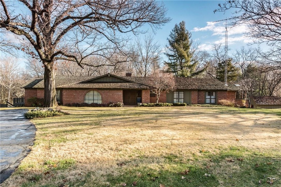 210 Old Whayne Road.   Over 4366 square feet, two levels, 4 brs, 3.5 baths surrounded by Champion Oaks trees and views of Alice Valley and Town Branch Creek.